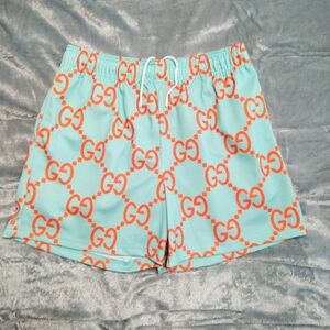 Bravest Studios Blue and Orange Athletic Shorts